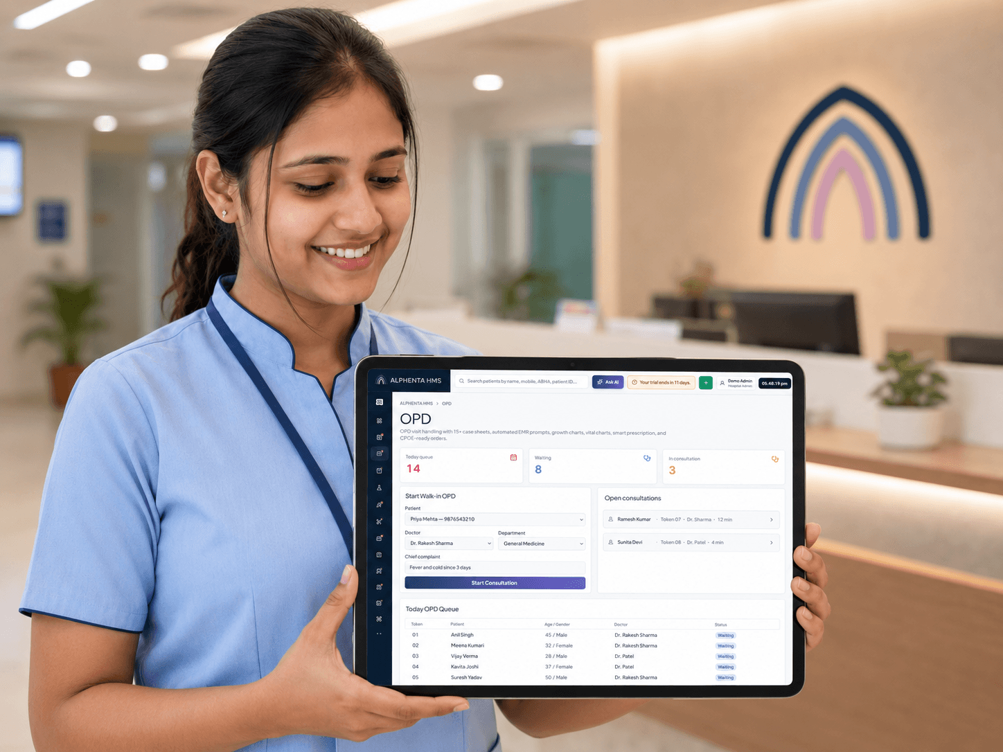 Hospital staff using ALPHENTA HMS on a tablet